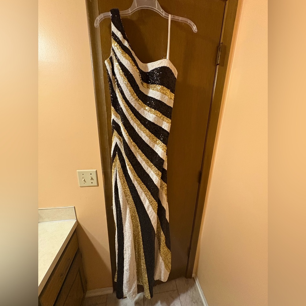 La Femme white, gold, & black striped sequin open back one shoulder gown